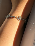 Bracelet fleurs rose et strass argenté